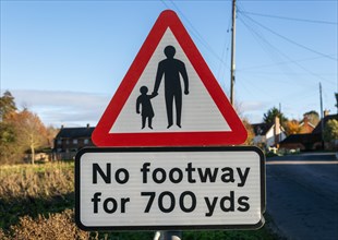 Red triangular road sign No Footway for 700 yards, Shottisham, Suffolk, England, UK