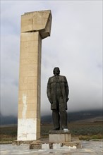 Huge statue at entrance road to Buzludzha monument former communist party headquarters, Bulgaria,