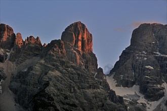 Alpenglow at sunset over the mountain Monte Cristallo in the Dolomites, Italy, Europe