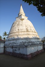 White stupa dome of Buddhist temple at Mirissa, Sri Lanka, Asia