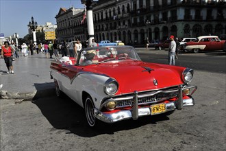 Ford convertible, open-top vintage car from the 1950s in the centre of Havana, Centro Habana, Cuba,