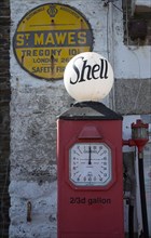 Old shell petrol pump, St Mawes, Cornwall, England, UK