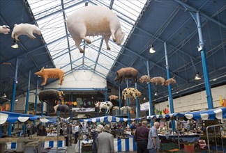 Flea market inside Market Hall building, Abergavenny, Monmouthshire, South Wales, UK