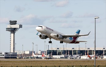 An Airbus A-320 of the airline Eurowings takes off at BER Berlin Brandenburg Airport Willy Brandt,