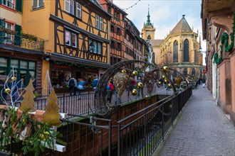 Historic half-timbered houses with Christmas decorations, willow arch, Christmas market, city
