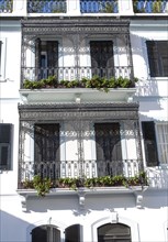 Ornate iron balconies in traditional historic building, Gibraltar, British terroritory in southern