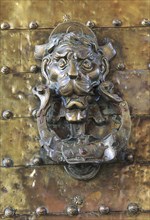 Detail of historic brass door knocker Cordoba, Spain, Europe