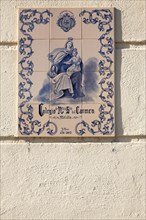 Close up of ceramic tiles sign for Lasalle de Carmen college, Melilla autonomous city state Spanish