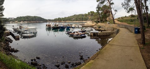 View from the promenade path to a bay, small harbour, panoramic view, near Veli Losinj, Kvarner