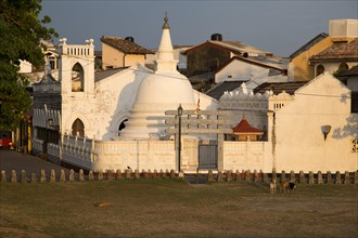 White stupa of Buddhist temple in the historic town of Galle, Sri Lanka, Asia