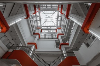 View of a modern staircase with red accents and geometric shapes, City Centre, Pforzheim, Germany,