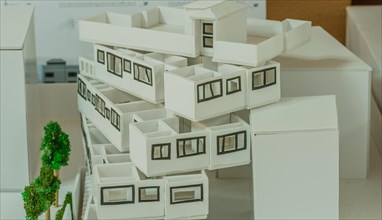 Closeup of student architectural design depicting stacked units in a fan shape with open roof top