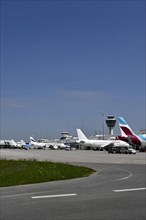 Overview Eurowings, Iberia, Finnair, KLM and Air Lingus aircraft at check-in position at Terminal 1