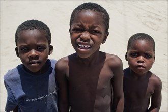 African children, boys, group, global, camera view, gaze, childhood, trio, looking, looking at,