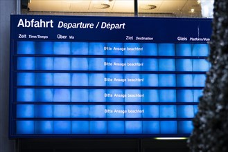 A large display board at Berlin Central Station reads Please note the announcement! Today is the