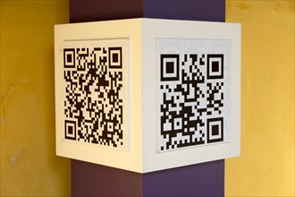 Black and white cube showing Quick Response Code or QR code to link with a website