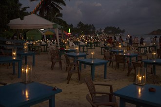 Candles on tables of beach bar, Mirissa, Sri Lanka, Asia