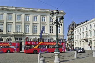 Double decker bus in front of the Musee Magritte Museum, MMM at the Place Royale, Royal Square,