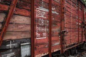 Side view of an old wooden goods wagon with faded red lettering, Dahlhausen railway depot, Lost