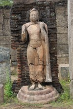 Carved stone Buddha, Hatadage building, The Quadrangle, UNESCO World Heritage Site, the ancient