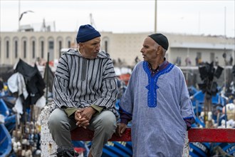 Portrait, Men sitting in the harbour, Essaouira, Morocco, Africa