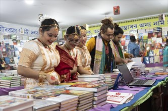 Book readers browsing books at a stall during Assam Book Fair, in Guwahati, Assam, India on 29