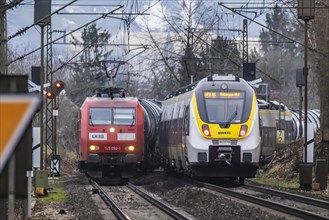 Railway line near Stuttgart with regional train from bwegt, SWEG. RBH Logistics goods train, class