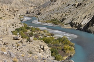Tsarab River, cutting across the Zanskar Range of the Himalayas in Ladakh, seen on a sunny day,