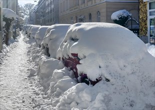 Parked cars after heavy snowfall, Munich, Bavaria, Germany, Europe