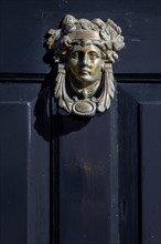 Door knocker on an old front door, Texel, North Sea island, North Holland, Netherlands