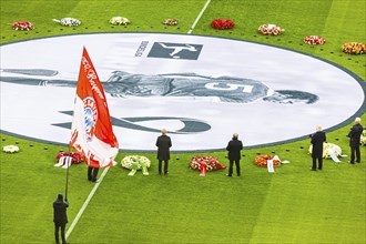 Former national football players bid farewell to Franz Beckenbauer, FC Bayern fan club waves flag,