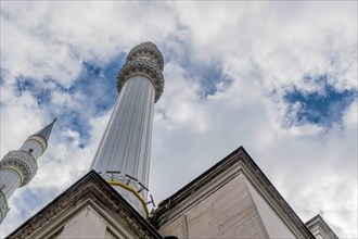Vertical view of conical minarets of mosque located in Istanbul, Turkiye
