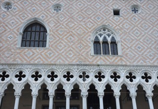 Detail of Doge's Palace (Palazzo Ducale) facade, famous tourist attraction in Venice, Italy, Europe