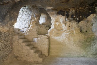 Interior view of a cave with visible erosion and highlighted cave architecture, Aladja Monastery,