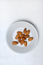 Almonds in plates, Prunus dulcis