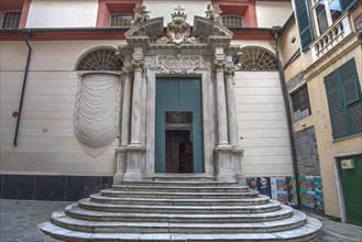 Entrance portal of the baroque Basilica di San Siro, the oldest church in the city, Via S. Siro, 4,