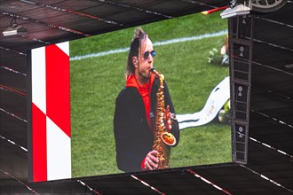 Saxophonist Noah fisherman plays at the memorial service, funeral service of FC Bayern Munich for
