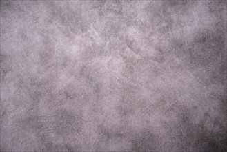 A simple grey concrete surface with an abstract texture