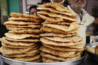 Bread selling, street bazaar, Udaipur, Rajasthan, India, Asia
