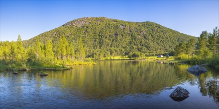 A small lake near Vinje, landscape format, inland water, shore, mountain, landscape shot, panorama