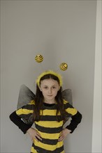Girl in a bee costume