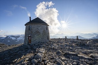 DNT's old mountain hut Skalatarnet, at the summit of Skala, Sonnenstern, Loen, Norway, Europe