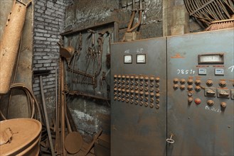 Switch cabinet and tool board in the bronze powder production room in a metal powder mill, founded