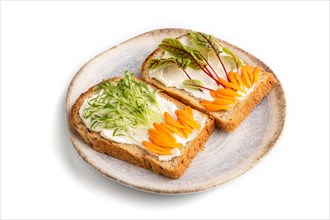 White bread sandwiches with cream cheese, calendula petals and microgreen isolated on white