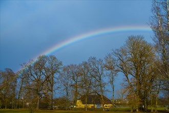Rainbow over the castle park, Donaueschingen, Baden-Wuerttemberg, Germany, Europe