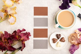 Set of gray and brown business cards with cup of cioffee, chocolate candies, purple and burgundy