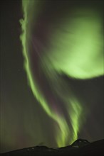 Northern lights in autumn at Arctic Circle Center Norway. Kp Index 5 to 6