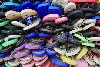 Shoe sale, street bazaar, Udaipur, Rajasthan, India, Asia