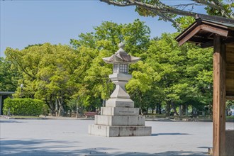 Large stone carved lantern in plaza at Peace Memorial Park in Hiroshima, Japan, Asia