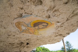 A ceiling fresco of an angel in a cave damaged by erosion, ceiling painting, Aladja Monastery,